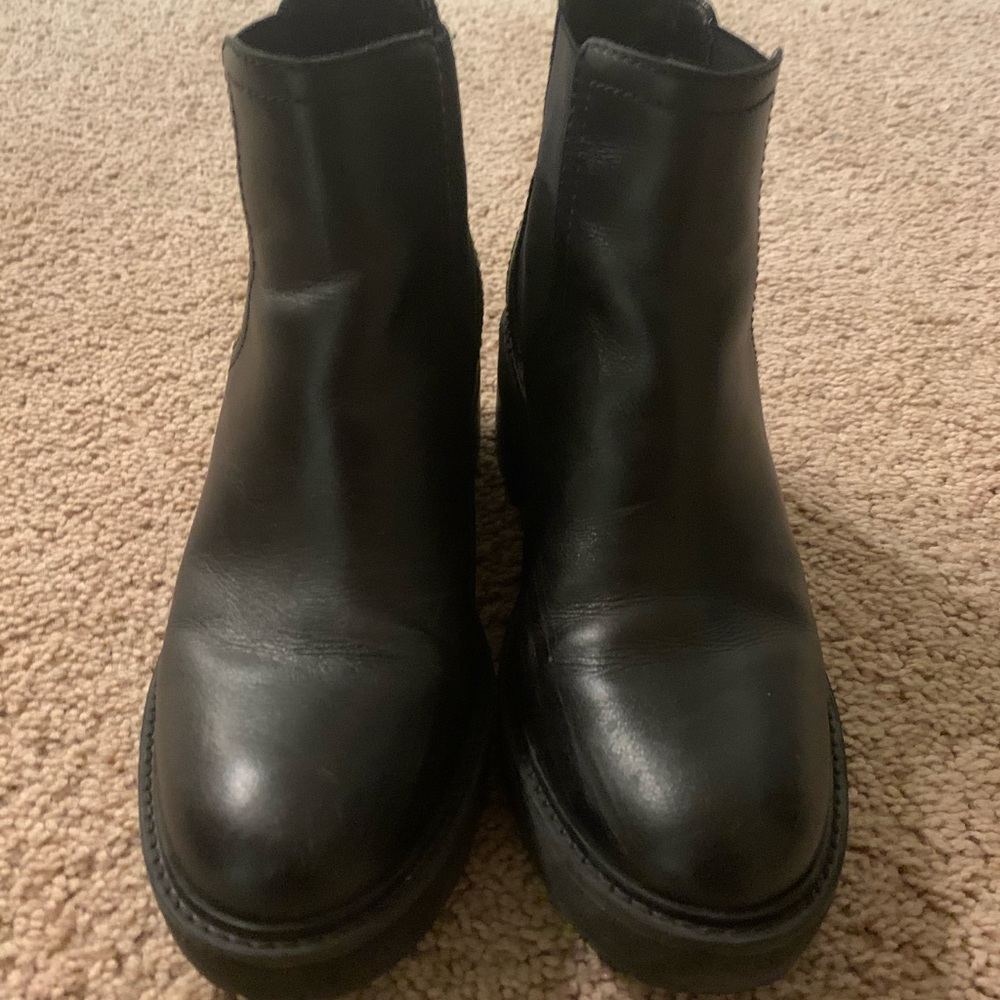 Black leather heeled boots